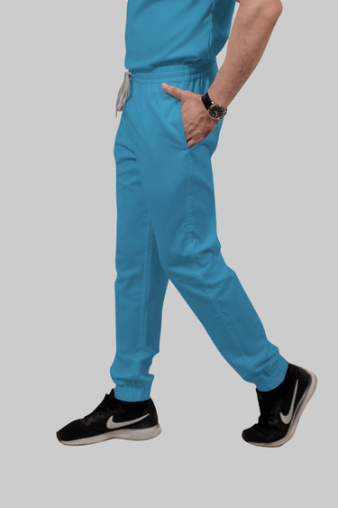 Stretchable (2Way) Female Peacock Blue Mandarin Neck With Jogger Scrub Set
